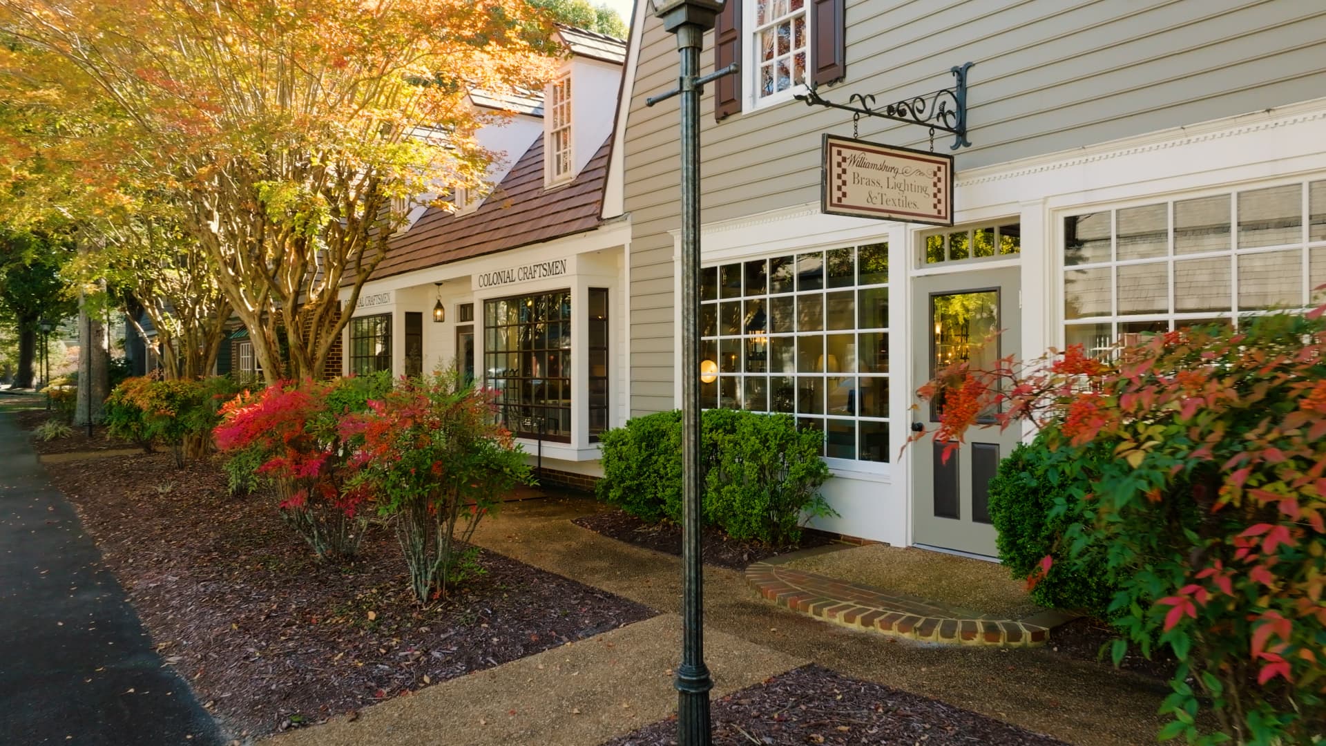 Storefronts of The Shops at Carolina Furniture of Williamsburg in the fall